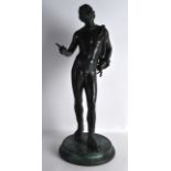 A GOOD 19TH CENTURY ITALIAN GRAND TOUR BRONZE OF A MALE modelled with genitals exposed upon a