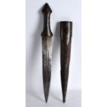 A 19TH CENTURY INDIAN BRONZE AND GOLD INLAID DAGGER with stylised scrolling decoration. 1ft 2ins