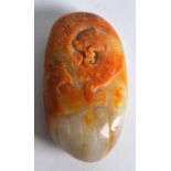 A CHINESE CARVED JADE BOULDER carved with a beast and a phoenix. 2.25ins wide.