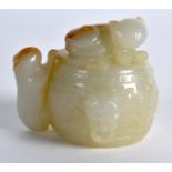 AN EARLY 20TH CENTURY CHINESE CARVED WHITE JADE FIGURE depicting a cats seated upon a barrel,