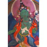 A GOOD 18TH/19TH CENTURY SINO TIBETAN THANGKA depicting the Green Tara seated beneath three buddhas.