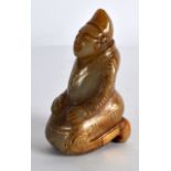 A CHINESE GOLD INLAID JADE FIGURE OF A SCHOLAR modelled kneeling. 3Ins high.