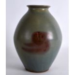 AN UNUSUAL CHINESE QING DYNASTY JUNYAO GLAZED VASE of ovoid form, with mushroom lip and purple