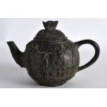 A CHINESE BRONZE TEAPOT AND COVER 20th Century, decorated with figures under coinage. 5Ins wide.