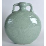 A CHINESE TWIN HANDLED CELADON MOON FLASK bearing Qianlong marks to base, decorated with a central