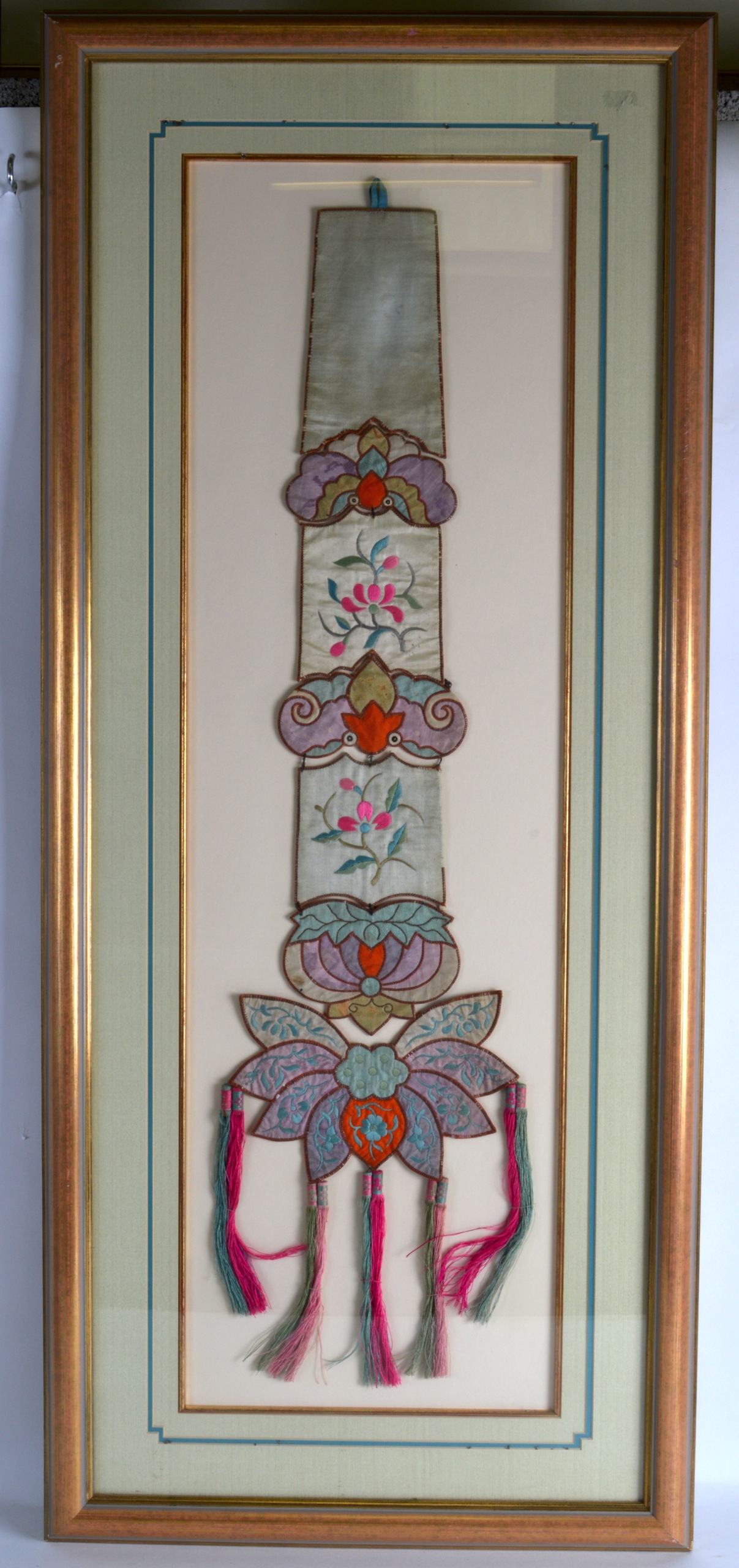 AN EARLY 20TH CENTURY CHINESE FRAMED SILKWORK HANGING decorated with bats and flowers. Silk 2ft 8ins