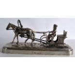 A LOVELY RUSSIAN SILVER FIGURE OF A MALE UPON A SLEDGE by Ivan Vonifatiyevich Yevsyigneyev, St