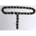 AN EARLY 20TH CENTURY EUROPEAN WHITE METAL AND BLACK BEAD LADIES BELT decorated with Native American