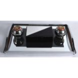 A RETRO BLACK MIRRORED GLASS JEWELLERY BOX together with a pair of candles & a mirrored tray. Tray