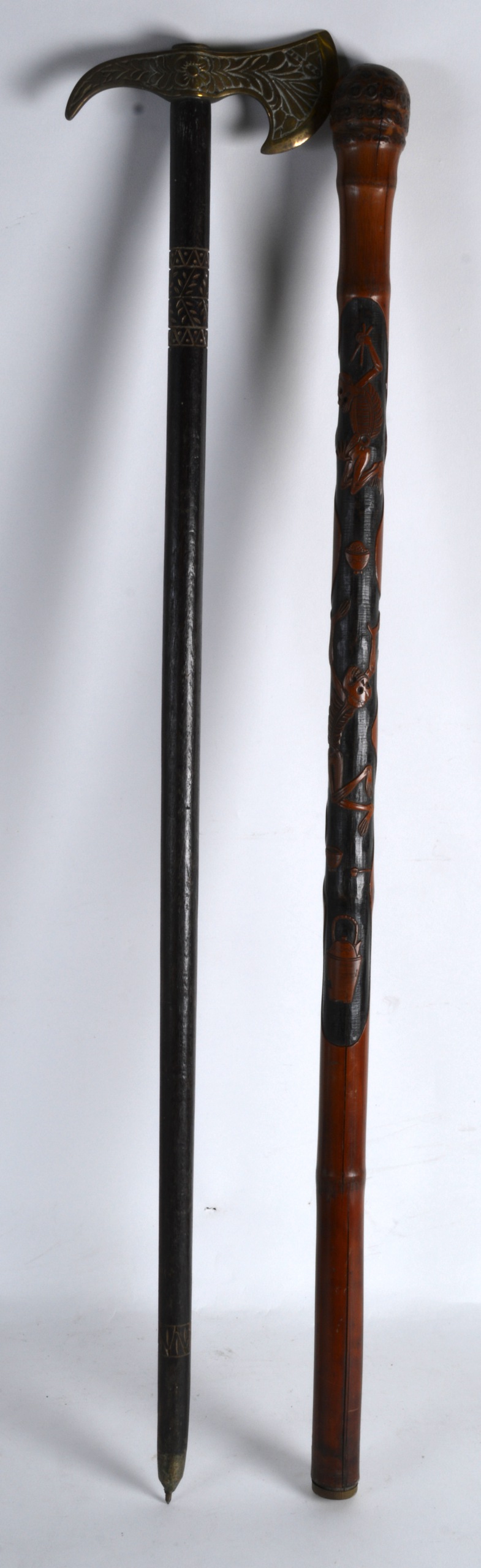 AN EARLY 20TH CENTURY JAPANESE MEIJI PERIOD BAMBOO GENTLEMANS CANE carved with hungry skeletons