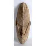 AN UNUSUAL SEPIC RIVER PAPA NEW GUINEA MASK incised with motifs. 1ft 3ins long.