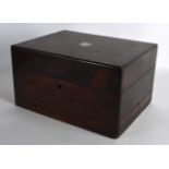 A LATE VICTORIAN ROSEWOOD CASED TRAVELLING BOX with various glass fittings and mother of pearl