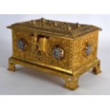 A GOOD 19TH CENTURY FRENCH ORMOLU AND CHAMPLEVE ENAMEL CASKET decorated with scrolling foliage and