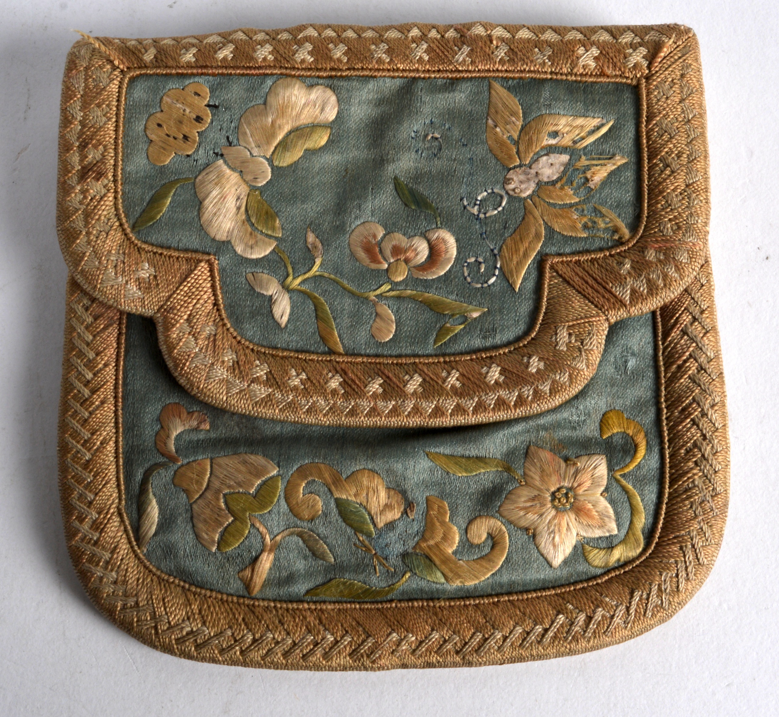 AN EARLY 20TH CENTURY CHINESE SILKWORK PURSE decorated with butterflies. 4.25ins wide.