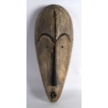 A STYLISH AFRICAN FANG NGIL GABON WOODEN MASK. 1ft 5ins long.