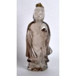 AN 18TH/19TH CENTRY CHINESE CARVED ROCK CRYSTAL FIGURE OF SAGE modelled holding aloft a peach. 6.