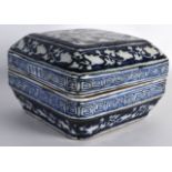 A CHINESE BLUE AND WHITE SQUARE FORM BOX AND COVER painted with stylised phoenix birds amongst