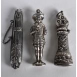 THREE SILVER NEEDLE CASE HOLDERS. (3)