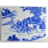 A GOOD LARGE EARLY 20TH CENTURY CHINESE BLUE AND WHITE PANEL painted with a procession, depicting