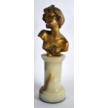 A LOVELY ART NOUVEAU BRONZE BUST OF A PRETTY FEMALE supported upon a cylindrical onyx base.