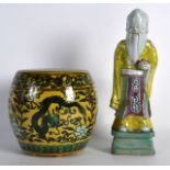 AN 18TH CENTURY CHINESE FAMILLE ROSE STONEWARE IMMORTAL together with a sancai glazed porcelain