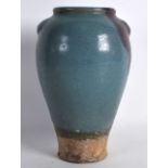 A CHINESE JUNYAO STONEWARE VASE with purple splash to body. 7.25ins high.