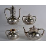 A VERY STYLISH AMERICAN ARTS AND CRAftS SILVER FOUR PIECE TEASET by Howard & Co, decorated with