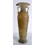 AN UNUSUAL EARLY TWIN HANDLED GLASS VASE possibly Roman. 9.75ins high.