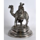 AN UNUSUAL JAMES DIXON & CO SILVER PLATED FIGURE depicting a male seated upon a camel. 7.25ins