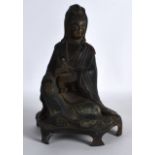 A CHINESE BRONZE FIGURE OF GUANYIN modelled holding a small child. 9.5ins high.