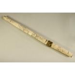 A JAPANESE CARVED BONE WAKISASHI, early 20th century, with 12 ¾" blade, brass ferrules, sectional