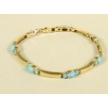 AN OPAL BRACELET, the six curved 14ct gold bars each interspersed with three claw set opals, 7 1/