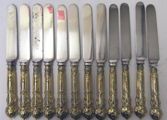 A SET OF TWENTY FOUR GOLD PLATED DESSERT KNIVES, c.1900, mainly Christofle with Gorham steel blades, - Image 3 of 3