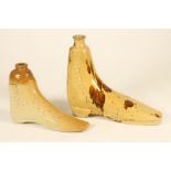 A SALTGLAZE STONEWARE SHOE WARMER, mid 19th century, the ankle laced low heeled boot impressed