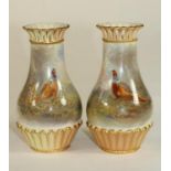 A PAIR OF ROYAL WORCESTER CHINA SMALL VASES, 1904, of baluster form with arcade pierced rims,