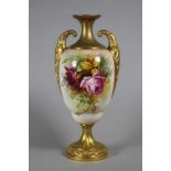 A ROYAL WORCESTER CHINA VASE, 1918, of ovoid form with waisted neck and two high lug handles on a