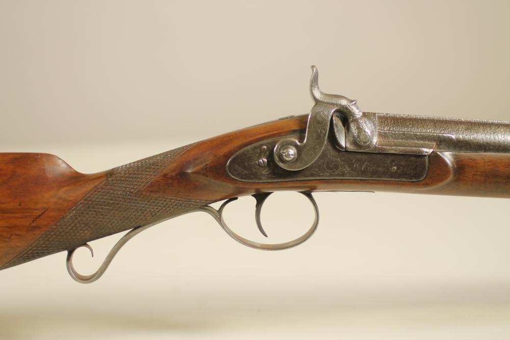 A PERCUSSION SPORTING GUN BY W. EGAN, with 31" sighted damascus barrel, foliate scroll engraved