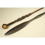 A ZULU LONG KNOBKERRIE, with carved twist decoration towards the bulbous head, 38" long, together