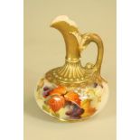 A ROYAL WORCESTER CHINA EWER, 1910, of squat globular form with loop handle and high neck and lip,
