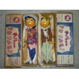 Two 1950's Pelham Puppets; Mr Turnip and Mrs Sarah Swede, both complete, in brown boxes, blue/maroon