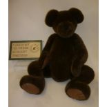 A large Boyds Collection bear "Ben" covered in brown plush, with label, 40" high, and an