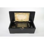 A CONTINENTAL MUSICAL BOX, 19th century, the comb and 4 1/2" drum movement playing six airs,