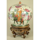 A CHINESE PORCELAIN JAR AND COVER of ovoid form, painted in polychrome enamels with a procession