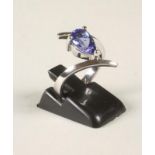 A TANZANITE RING, the pear cut stone claw set to an open 14kt white gold shank, size N 1/2