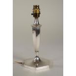 AN ELECTRIC SILVER TABLE LAMP BASE, makers probably H. Emanuel, Sheffield 1925, of flared