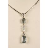 AN AQUAMARINE AND PEARL DROP PENDANT, the diamond bale hung with an oval facet cut aquamarine and