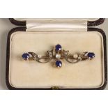 A VICTORIAN SAPPHIRE, PEARL AND DIAMOND BAR BROOCH, the knife edge bar centred by a pearl flanked by