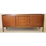 A VANSON TEAK SIDEBOARD, 1960/70's, of low oblong form, the raised ledge back over three recessed