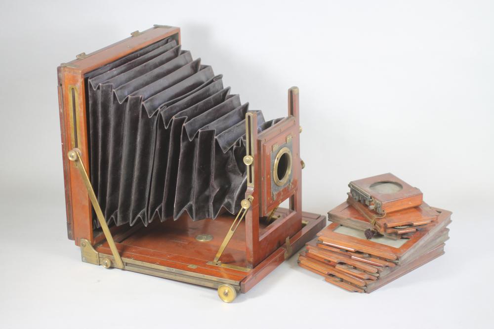 A SANDS, HUNTER & CO. LTD MAHOGANY FIELD CAMERA, full plate, in retailer's leather case, with four