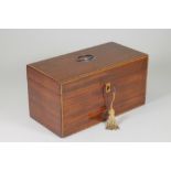 A LATE GEORGE III MAHOGANY TEA CADDY of plain oblong form with satinwood and ebony stringing,